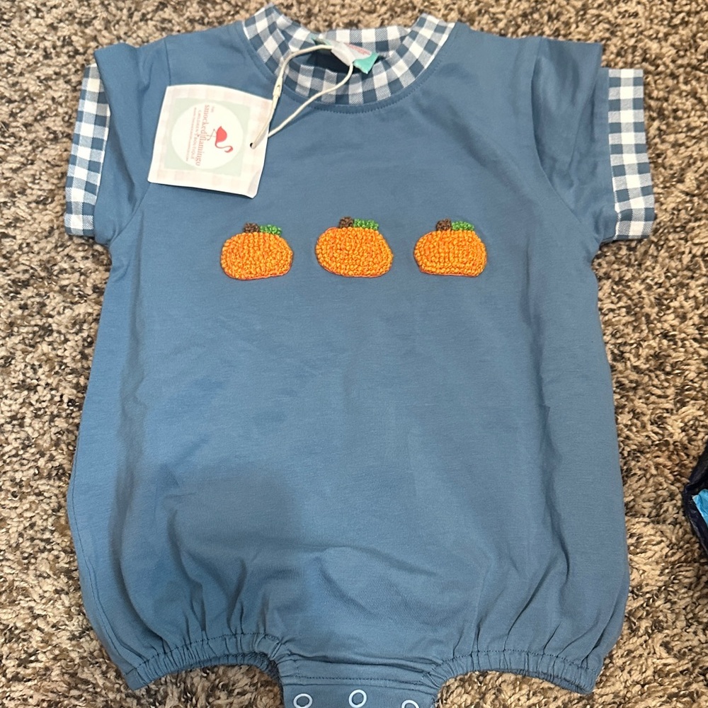 The smocked flamingo Pumpkin Kids bubble NWT. SMOCKED